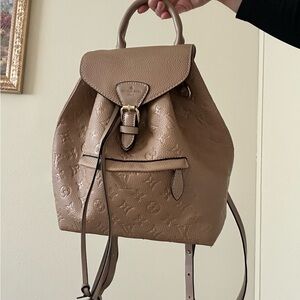 Tan leather backpack